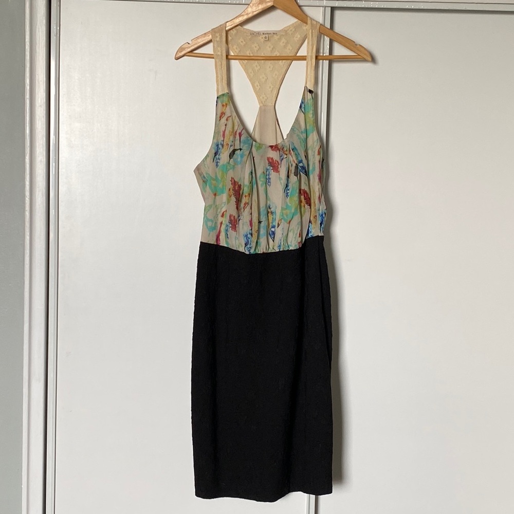 Rachel Roy dress, top flows more loosely and bottom is fitted